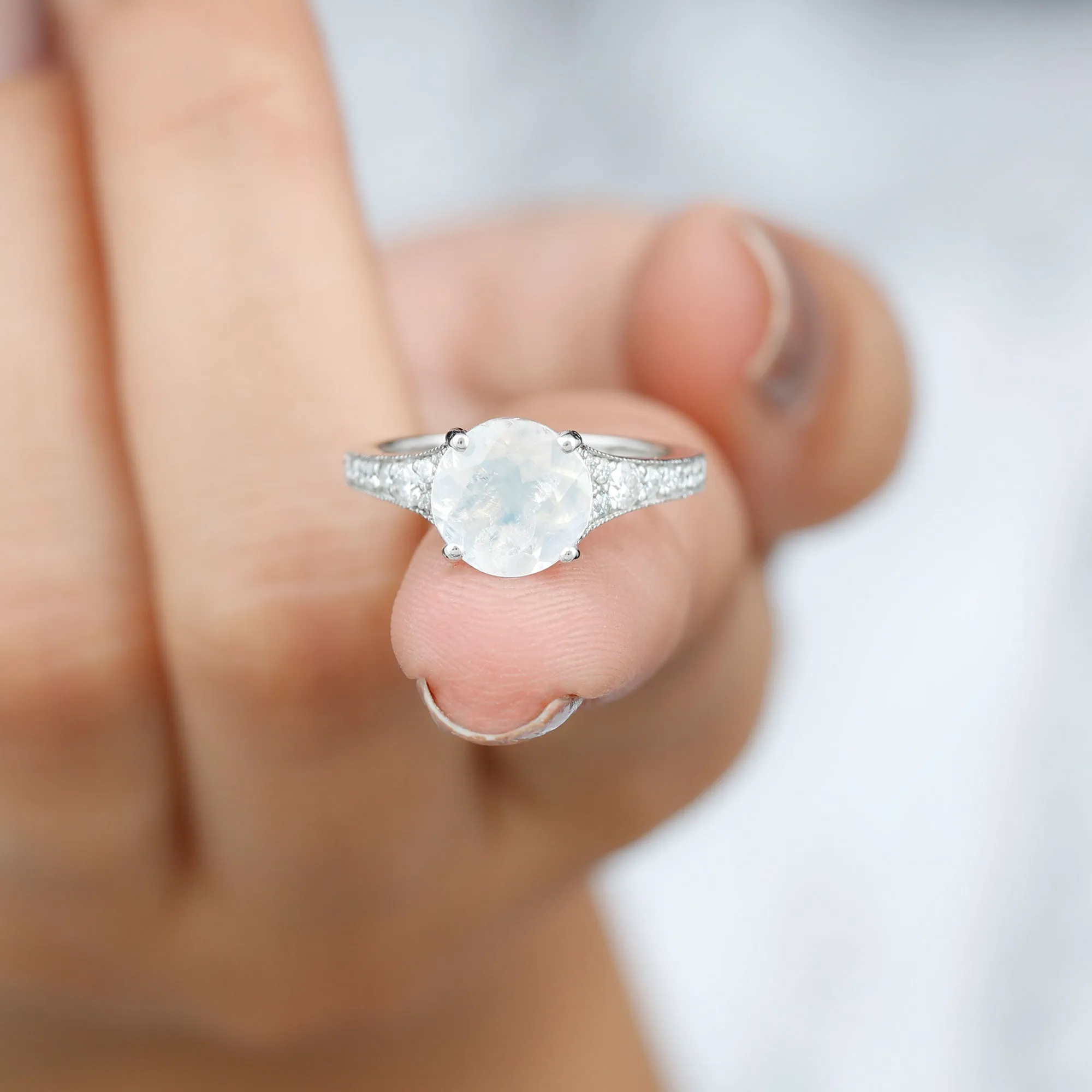 1.5 CT Moonstone Engagement Ring with Diamond Side Stones